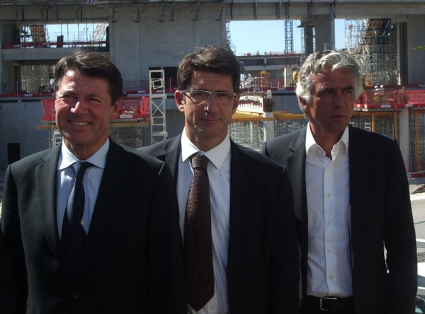 Christian Estrosi (deputy mayor of Nice), Xavier Lortat-Jacob (president of Nice Éco Stadium), and Jean-Pierre Rivère (president of OGC Nice) posing in front of the Allianz Riviera, still under construction. ©JV Christian Estrosi (deputy mayor of Nice), Xavier Lortat-Jacob (president of Nice Éco Stadium), and Jean-Pierre Rivère (president of OGC Nice) posing in front of the Allianz Riviera, still under construction. ©JV